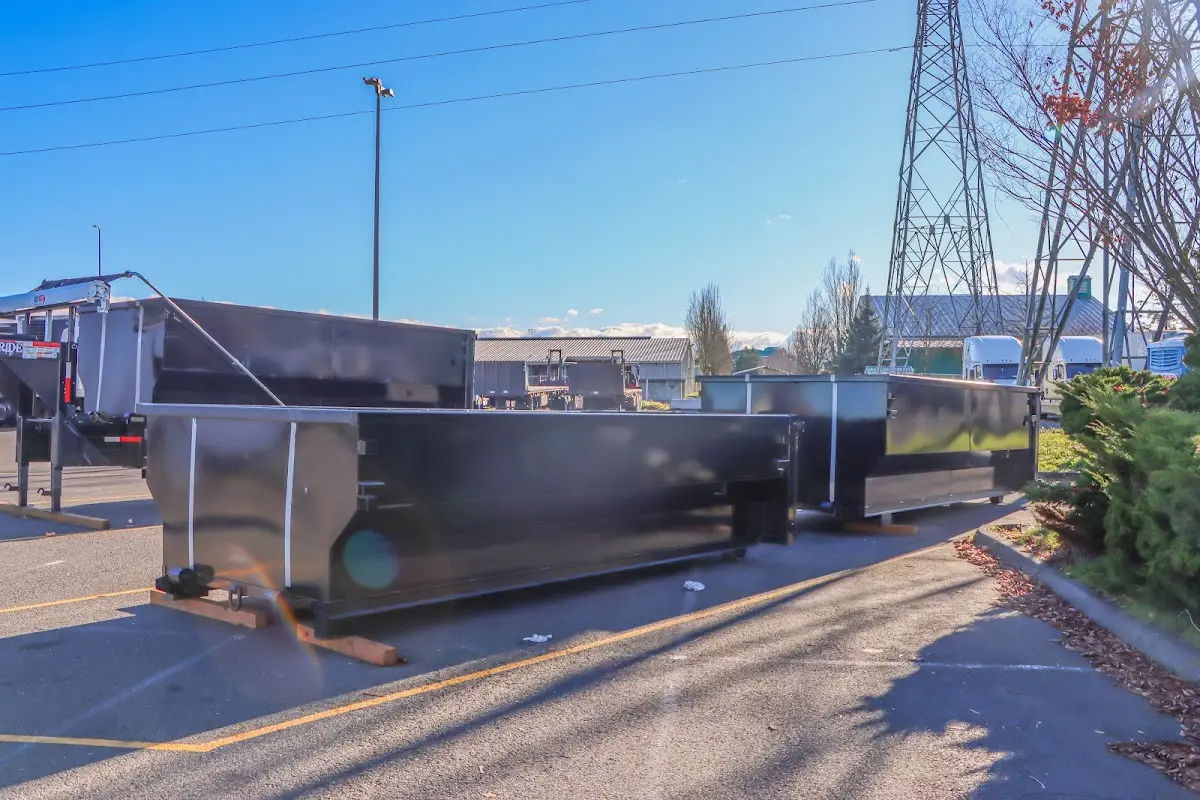 Roll-off dumpster ready for waste disposal at job site for 8 Yard Dumpster Rental in Mena